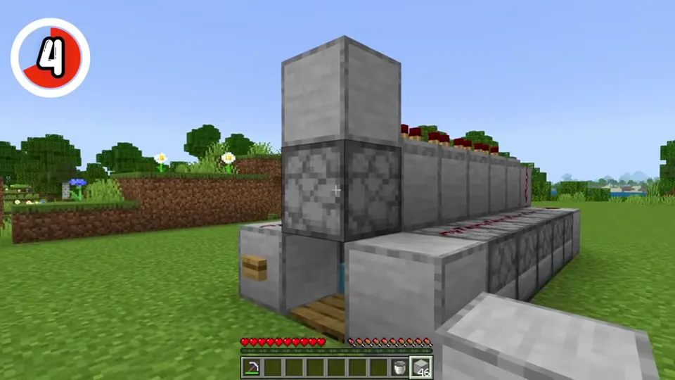 A Minecraft TNT cannon with rows of dispensers and redstone wiring from the BlazedMC build video.